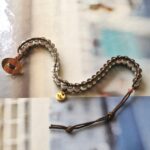 bransoletka z masy perłowej i hematytu. utkana na krośnie-miękki kształt