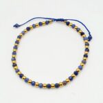 bransoletka z kamienia naturalnego lapis lazuli i stali szlachetnej w kolorze złotym