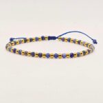 bransoletka z kamienia naturalnego lapis lazuli i stali szlachetnej w kolorze złotym